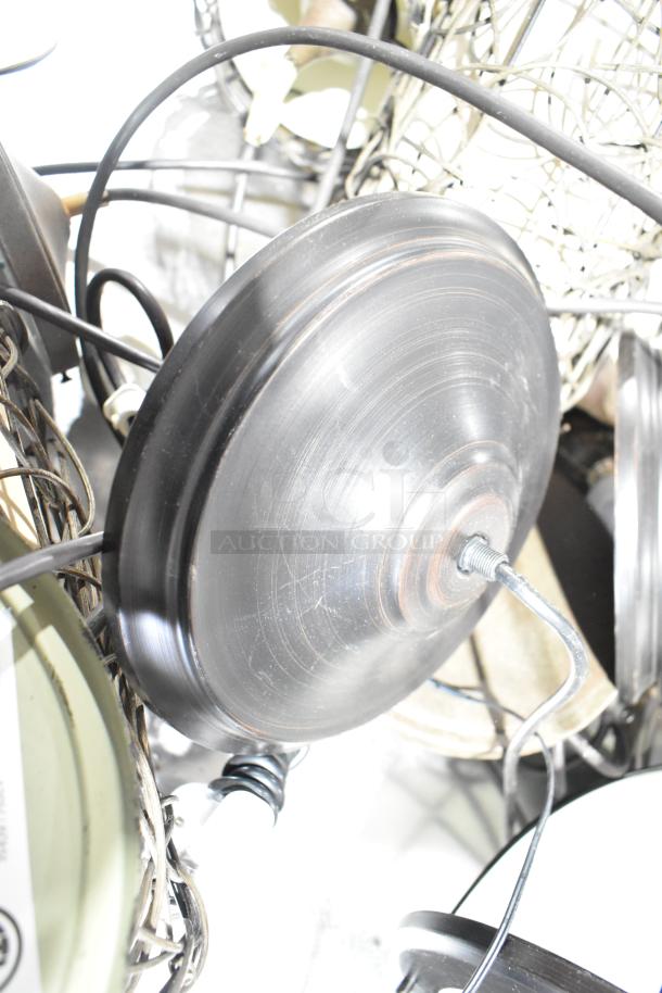 11 light fixtures with various designs and finishes, showing wired connections, suitable for diverse settings.