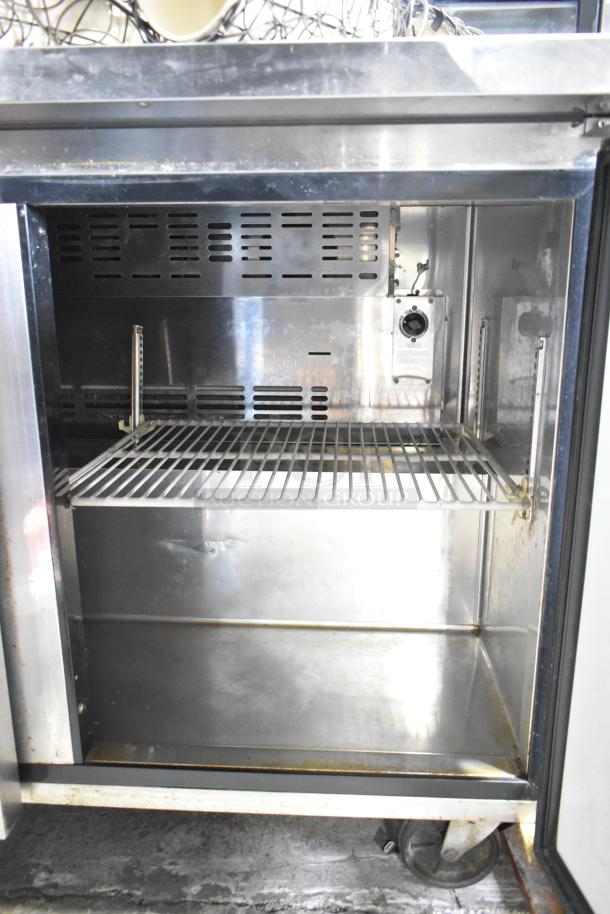 Centaur CUF-48 commercial 2-door undercounter freezer, stainless steel, adjustable shelves, 115 V, 1 phase, used condition.