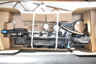 Pentair Everpure water filtration system, pre-owned, no cartridges, includes gauges, in original packaging, boxed.