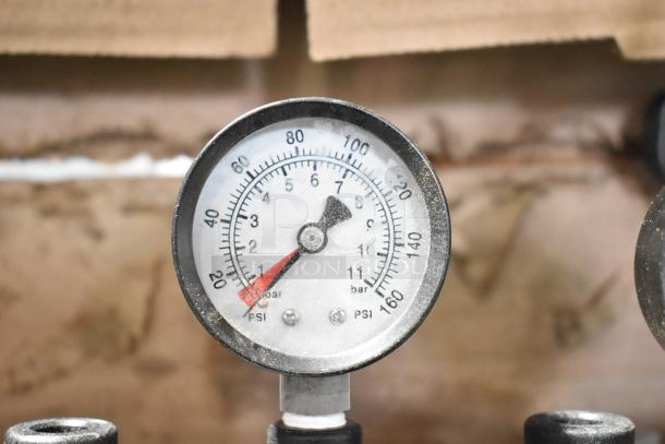 Pentair Everpure Water Filtration System gauge, showing pressure in PSI and bar, no cartridges included, slight wear visible.