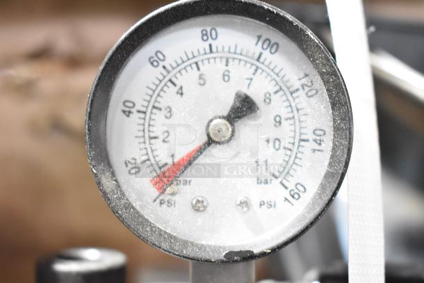 Pressure gauge on Pentair Everpure Water Filtration System. Reads up to 160 PSI. No cartridges included. Some wear visible.
