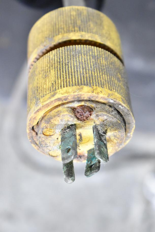 Aging electrical plug with visible corrosion, detailing condition for Federal Industries RSSM460SC merchandiser.