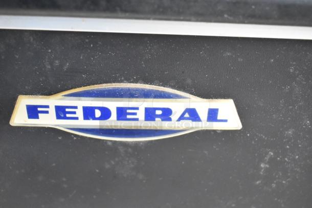 Federal Industries logo on RSSM460SC Merchandiser, indicating brand model. Slight wear. 115/208-230V, 1 Phase.