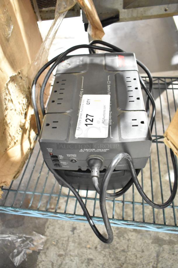 APC Uninterruptible Power Supply with multiple outlets, visible label number 127, in used condition.