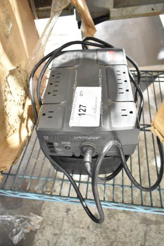 APC Uninterruptible Power Supply with multiple outlets, visible label number 127, in used condition.