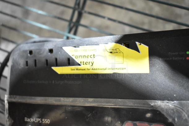 APC Uninterruptible Power Supply, model Back-UPS 550, in used condition with a visible yellow "Connect Battery" label.