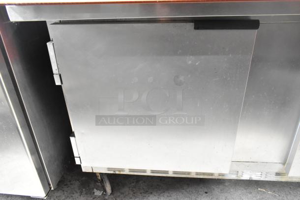 Beverage Air commercial prep table with mega top, Bain Marie style, on casters, 115 volts, 1 phase, showing light wear.