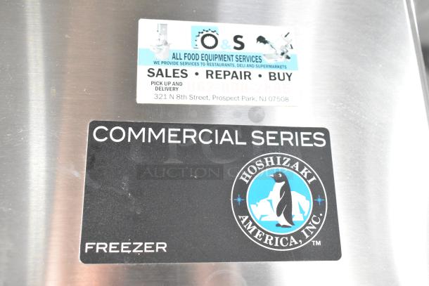Hoshizaki CF1B-FS commercial freezer with a Hoshizaki logo and "Commercial Series" label, 115 volts, 1 phase.