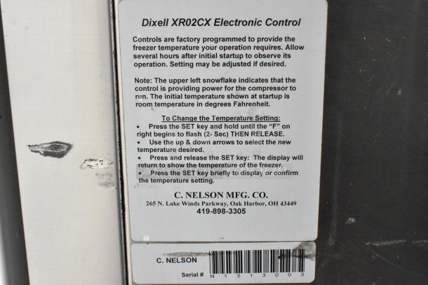 C Nelson BS 2 Commercial Chest Freezer with Dixell XR02CX Electronic Control, 115V, 1 Phase, label showing instructions and contact info.