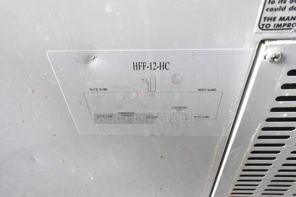 Excellence HFF-12-HC commercial chest freezer label, showing model name and wiring diagram, surface has minor scuffs.