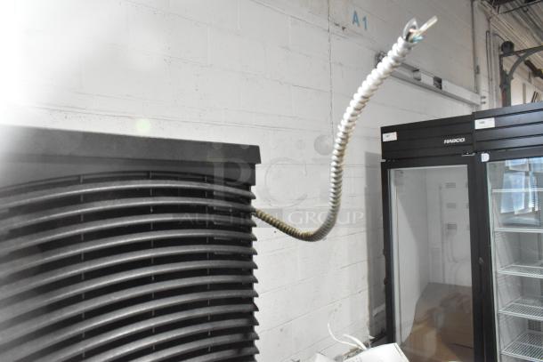 Koolaire ice bin head on Hoshizaki B-700PD commercial ice bin, excellent condition, with coiled electrical conduit visible.