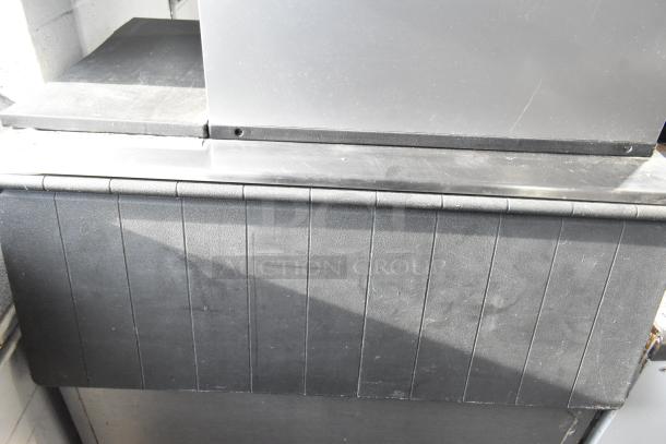 Koolaire ice bin head on Hoshizaki B-700PD bin. Sturdy build, slightly worn surface, ideal for commercial use.