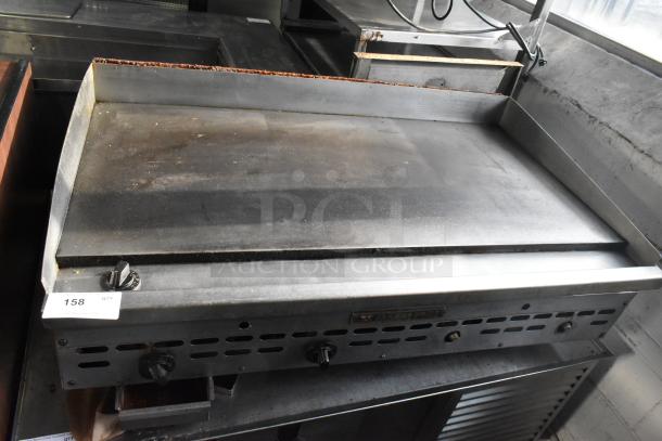 Bakers Pride commercial countertop gas griddle, used, stainless steel, dual knobs, item tag reads "158 QTY".