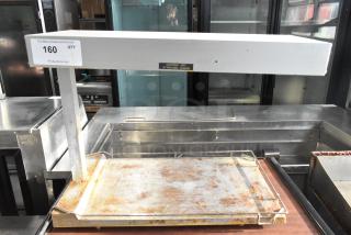 Hatco countertop food warmer, 120 volts, 1 phase, showing visible wear and rust on the warming tray, auction tag attached.