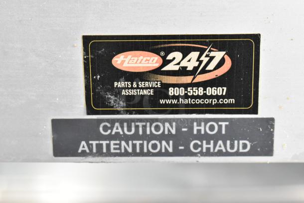 Hatco countertop food warmer, 120 volts, 1 phase, with label showing Hatco logo and caution sign.