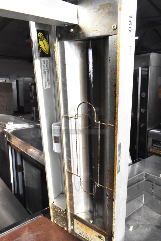 Hatco countertop food warmer, 120 volts, 1 phase, showing interior heating elements and safety labels, in used condition.