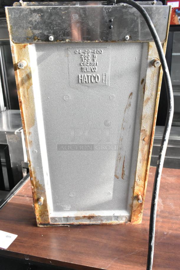Hatco countertop food warmer, 120 volts, 1 phase, visible rust on edges, model and specs embossed on surface.