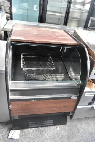 Structural Concepts commercial grab-n-go merchandiser in used condition, featuring a curved glass front and wood panel accents.