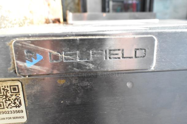 2021 Delfield UC4048P-STAR commercial cooler, stainless steel, visible logo plate, minor wear shown. 115V, 1 Phase.