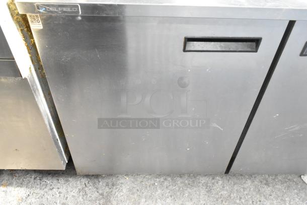 2021 Delfield UC4048P-STAR 2-door undercounter cooler, stainless steel. Visible brand label. Used, some wear.