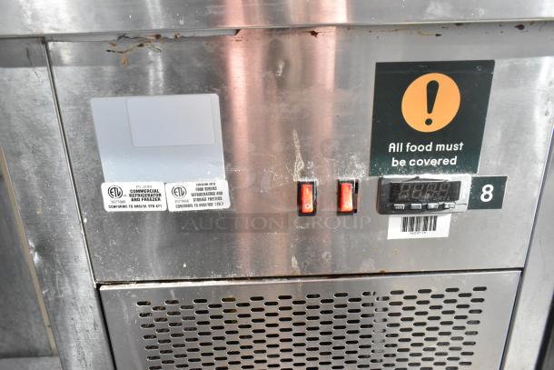 Commercial 2 Door Undercounter Cooler, stainless steel, ETL listed, features digital display, switches, and warning labels.