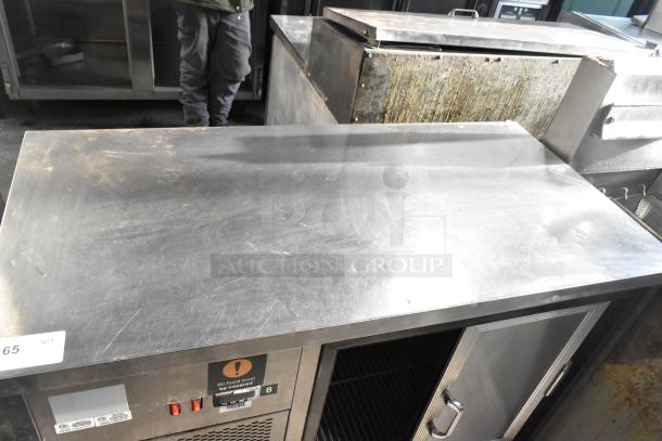 Commercial 2 Door Undercounter Cooler, stainless steel, visible wear, safety warning label, used condition.
