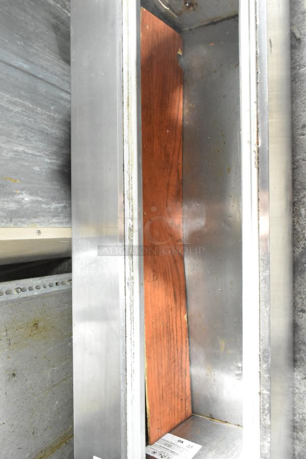 Silver King SKRCF Commercial Countertop Refrigerated Rail, 115 Volts, 1 Phase. Interior view showing metal lining and labels.