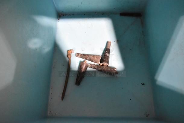 Manitowoc commercial ice machine head on bin, worn condition, includes rusted components, needs cleaning.