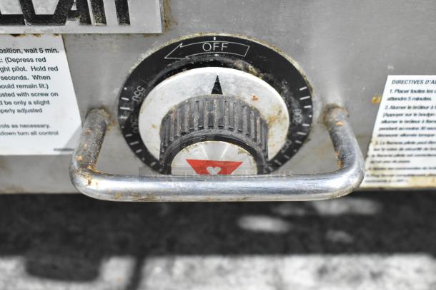 Vulcan PSA36-101 countertop natural gas griddle, 81,000 BTU. Features control knob and handle, slight wear visible.