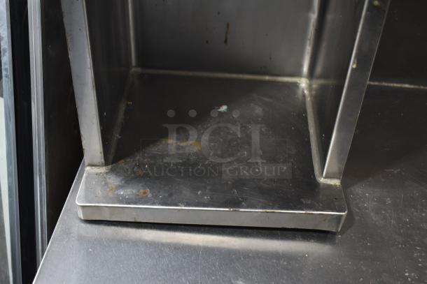 Vita-Mix VM0800A commercial countertop drink mixer, 120V, partially visible base, stainless steel, some wear evident.