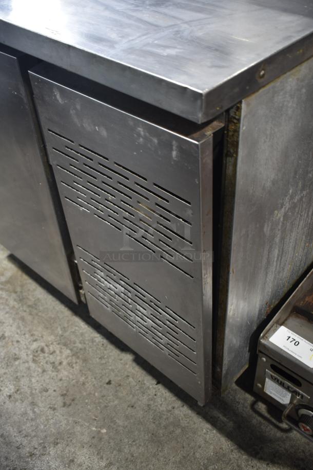 Migali commercial pizza prep table, stainless steel, 115 volts, 1 phase, vented front panel, good condition.