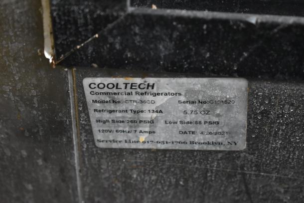 Cooltech CTR-36CD display case label showing model, serial number C101520, refrigerant type, and voltage info.