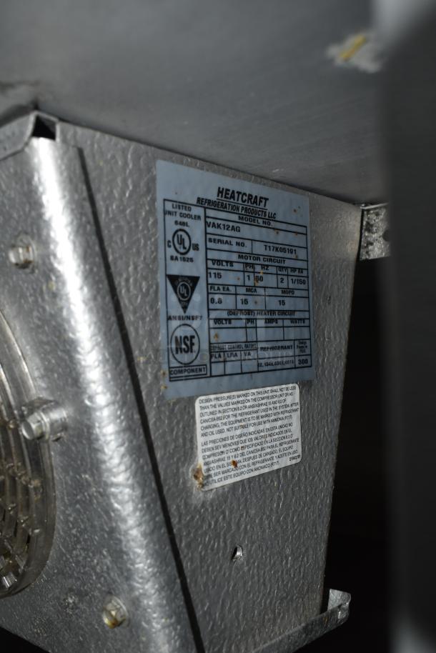 Commercial prep station label, Heatcraft model VAK12AG, UL listed, NSF certified, metal surface, on commercial casters.