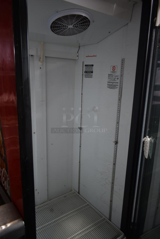 Metalfrio NG26CHC commercial cooler, single door, 115V, 1 phase, interior shelving, visible condition wear.