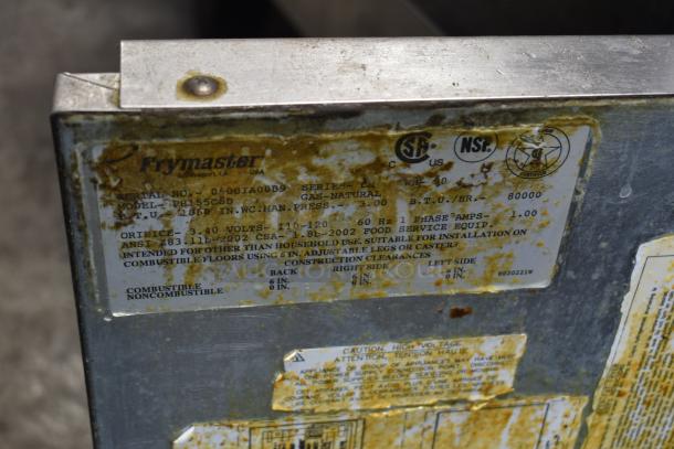 Frymaster PH155CSD commercial gas fryer, 105,000 BTU, with two metal fry baskets. Shows manufacturer label and specifications.