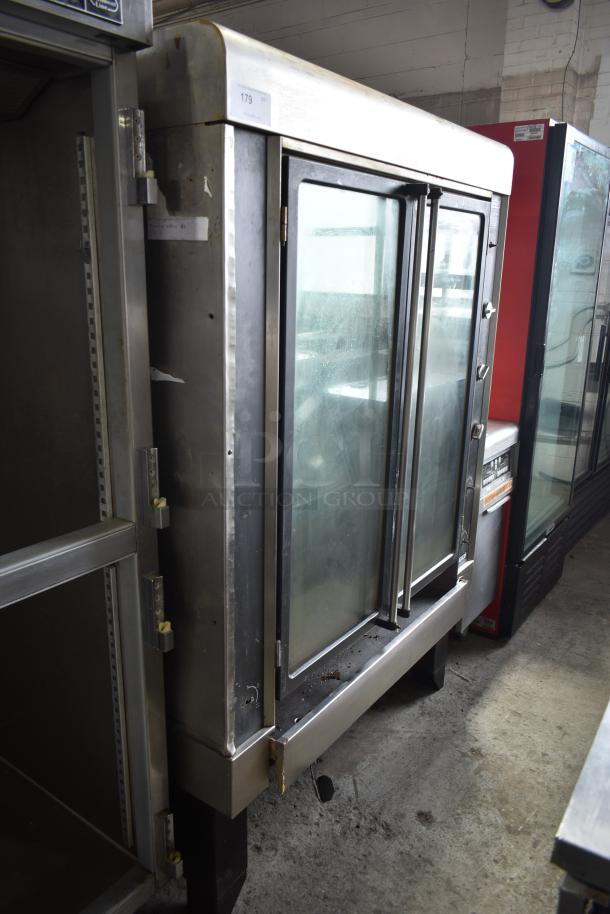 Hobart HGR06 commercial gas rotisserie oven, stainless steel, dual glass doors, used condition with visible wear.