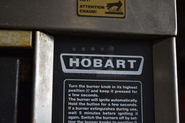 Hobart HGR06 Commercial Rotisserie Oven, natural gas powered, visible brand logo and operational instructions, used condition.