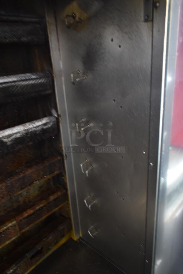 Hobart HGR06 commercial rotisserie oven interior; stainless steel, hooks visible, used condition, natural gas powered.