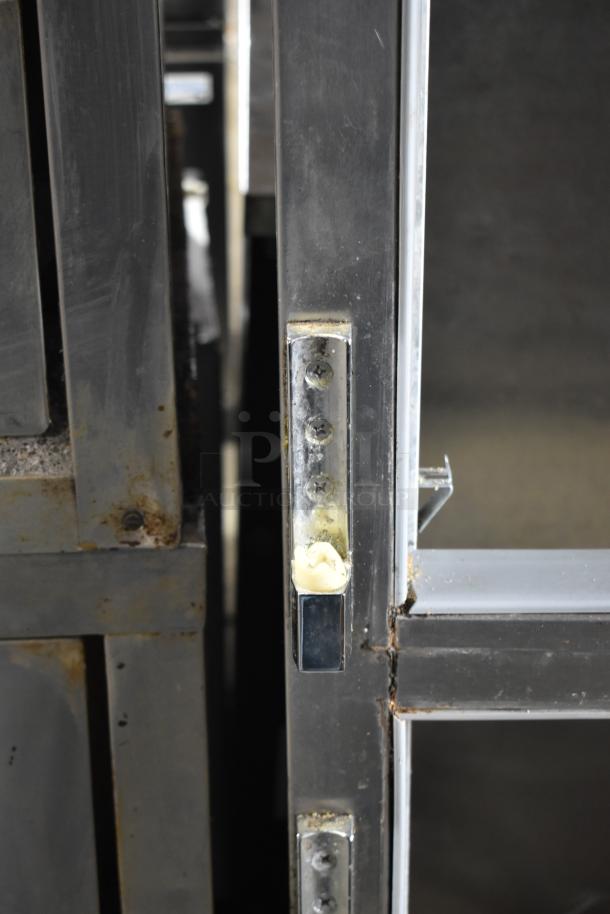 Beverage Air PF48-1AHS commercial cooler detail. Missing doors. Visible wear and rust. 115V, 1 phase.