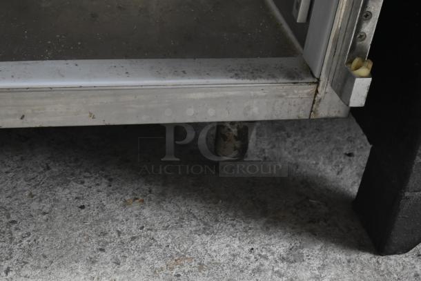 Beverage Air PF48-1AHS cooler, missing doors, shown with base and interior detail, 115 volts, used condition.