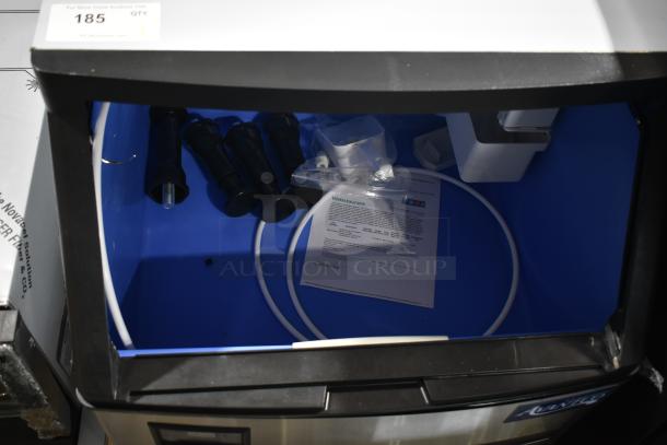 Brand new 2025 Avantco 194UCF280A ice machine, 299 lb capacity, 115V, 1 phase, with visible components and manual.