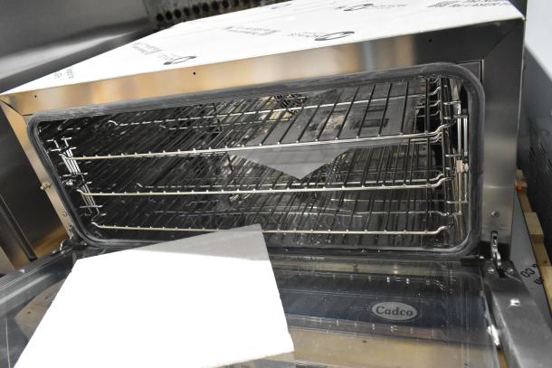 Brand new Unox Cadco XAFT183-US convection oven, full-size countertop model. Note broken glass. 208-240V, 1 Phase.