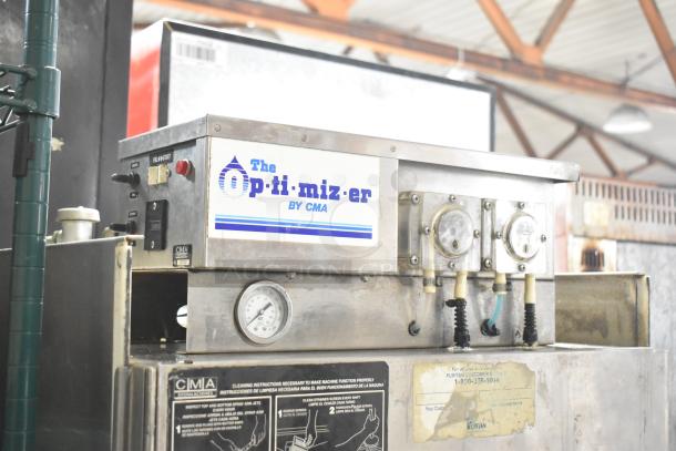 CMA Energy Mizer VA-AH-2 pass-through dishwasher, 120V, 1 phase, with control panel and pressure gauges, in used condition.