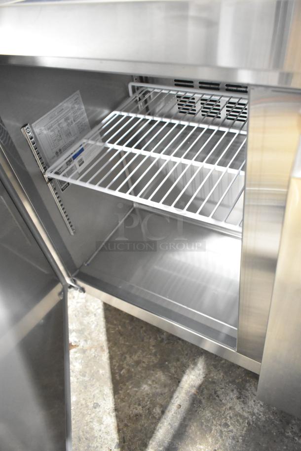 Brand new 2025 Avantco 178SSWT48FHC 2-door undercounter freezer on casters, 115V, 1 phase, with shelves and internal label.