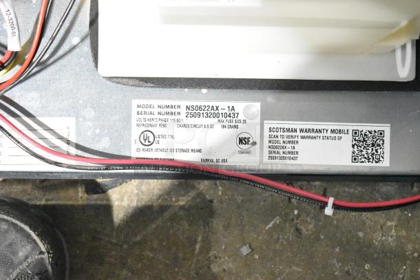 BRAND NEW 2025 Scotsman NS0622AX-1A Nugget Ice Machine, 664 lb., model and warranty labels visible, 115V, 1 Phase.