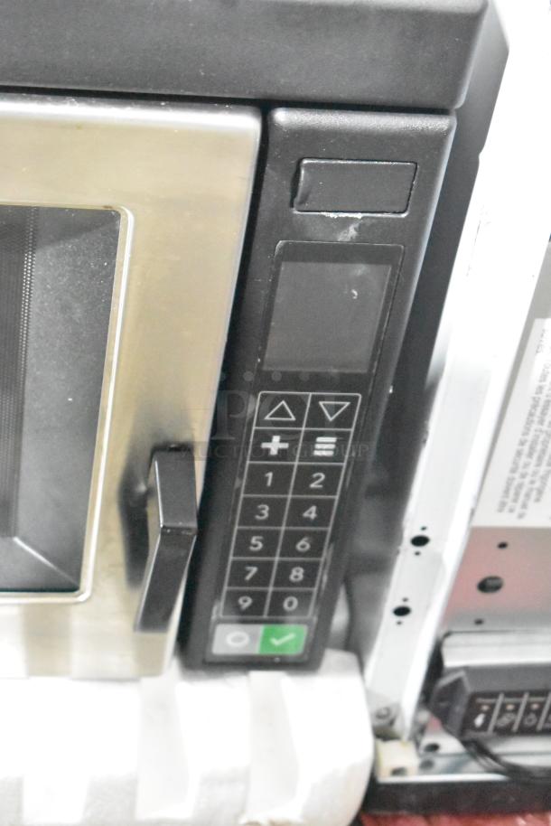 Amana RC30S2 stainless steel commercial microwave with push button controls, brand new with minor scratches. 208/240 volts.