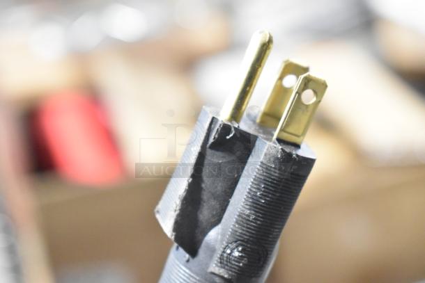 Close-up of a power plug with visible minor scuffs and scratches, used for the 2025 Hobart SDPE 20 Gallon Electric Polyethylene Salad Dryer.