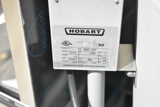Brand new Hobart SDPE 20-gallon electric salad dryer, scratch and dent, on casters. Label shows 115V, 1 phase, NSF certified.