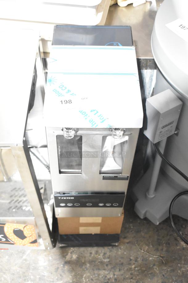 Brand new Fetco GRS-1202 double hopper coffee grinder, 2025 model, 10 lb. capacity, 120V, showing minor surface scratches.