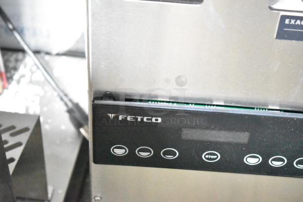 BRAND NEW 2025 Fetco GRS-1202 Coffee Grinder, double hopper, 120V, with minor cosmetic scratches, digital control panel visible.